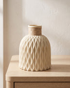 Beige rope neck vase, empty on a pale oak table