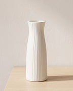 Fluted origami vase, 9.3 in, empty on a pale oak table