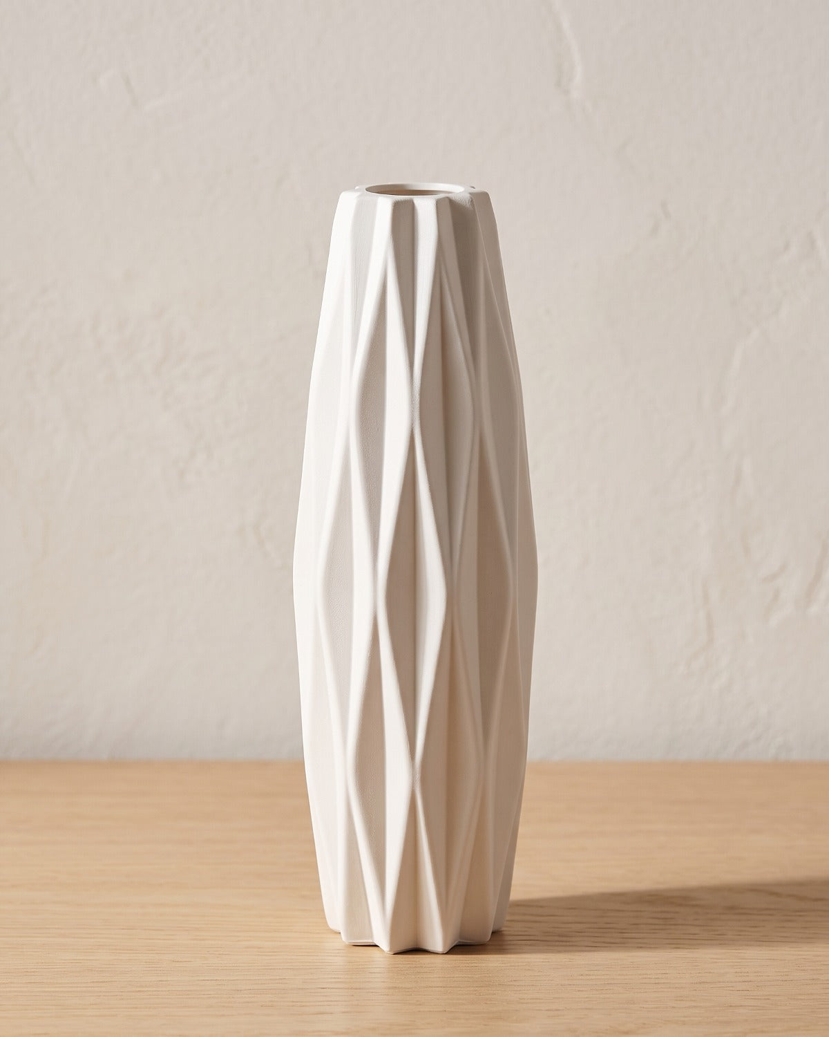 Faceted origami vase, 8.3 in, empty on a pale oak table