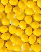Artificial lemons laid out together, showing the pack of twenty