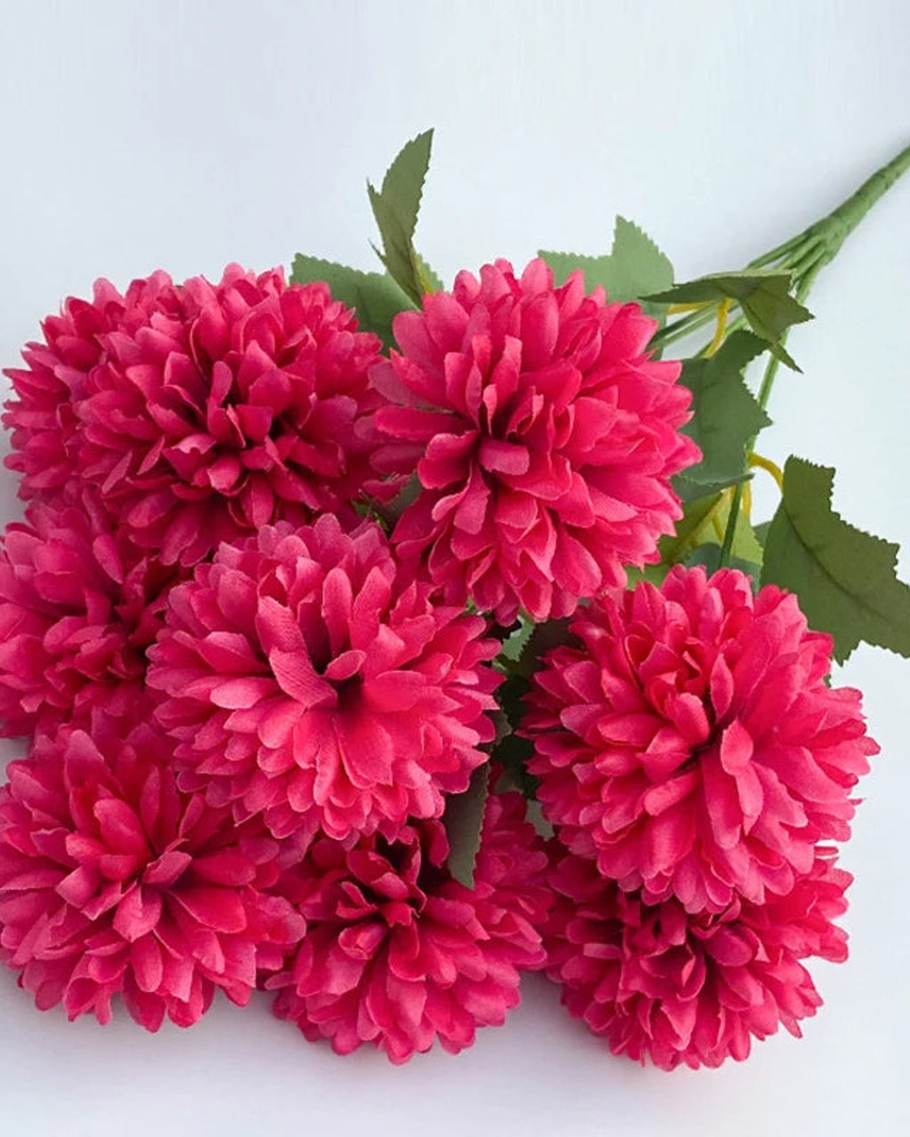 Magenta artificial pompom chrysanthemums, one bunch
