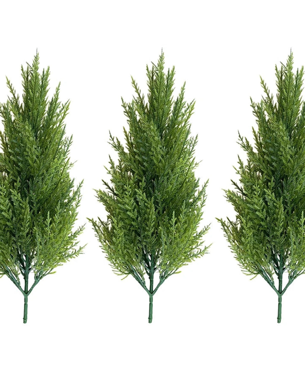 Three artificial pine trees without pots, side by side