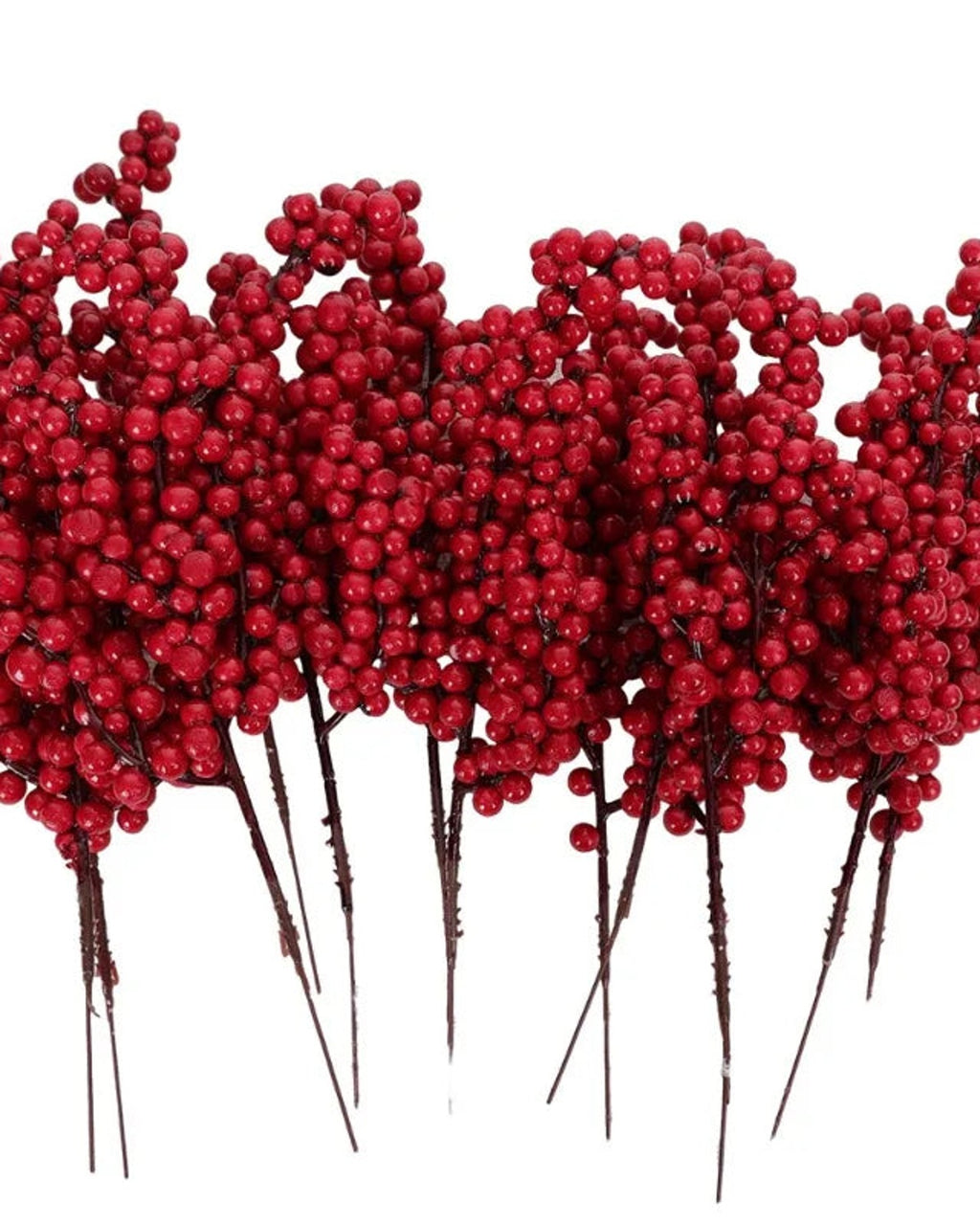 Several artificial berry branches gathered together, showing the bare dark stems