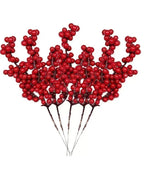 Five artificial berry branches gathered in a bunch