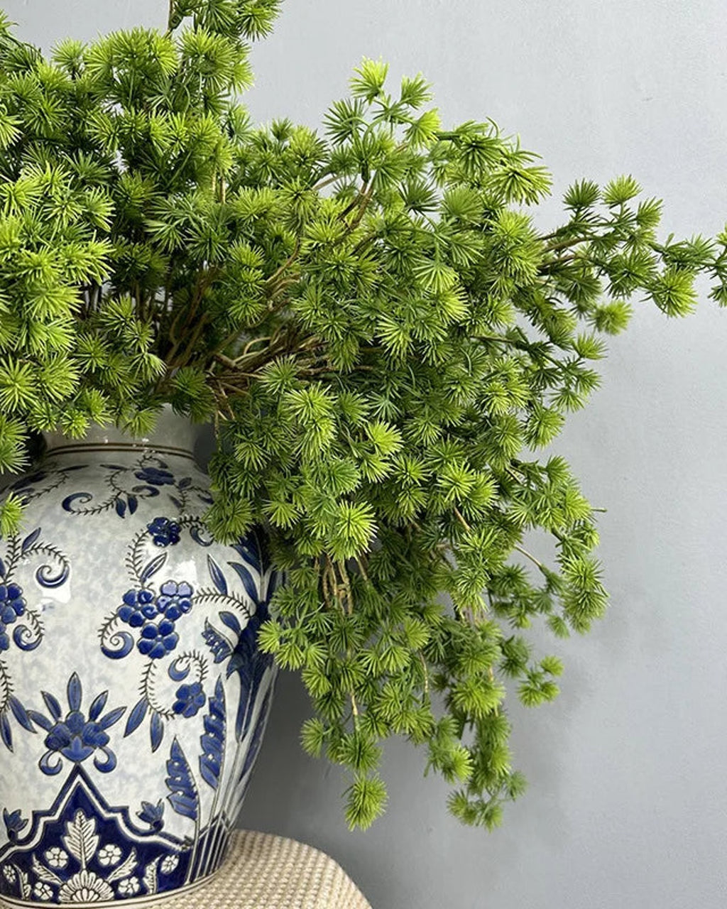 The same arrangement closer, showing the soft needle tufts along the twigs; each order is one branch, and no vase is included
