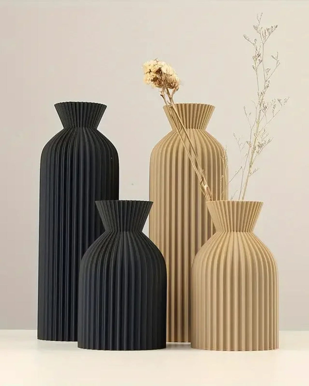 Black and khaki ribbed bottle vases in both sizes, grouped with a dried stem; stems not included