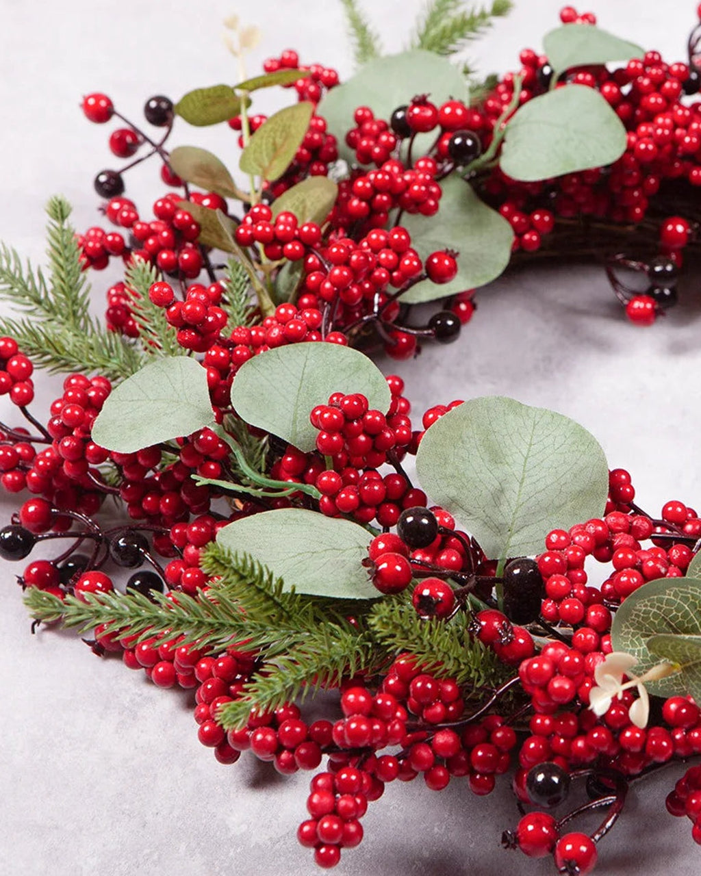 A close look at the berry and eucalyptus wreath