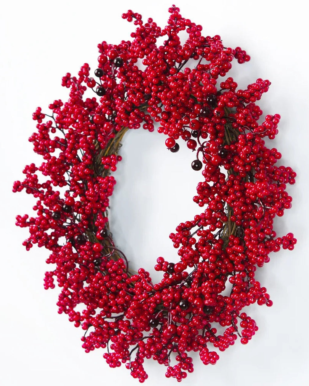The red berry wreath from the side, showing its depth