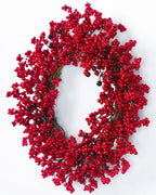 The red berry wreath from the side, showing its depth