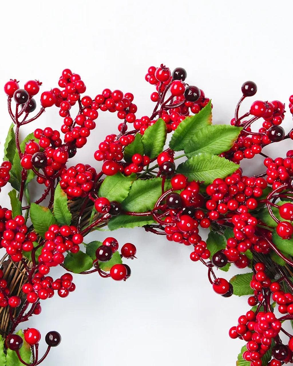 A close look at the berry and leaf wreath