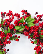 A close look at the berry and leaf wreath