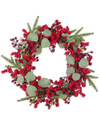 The berry and eucalyptus wreath on a plain white ground