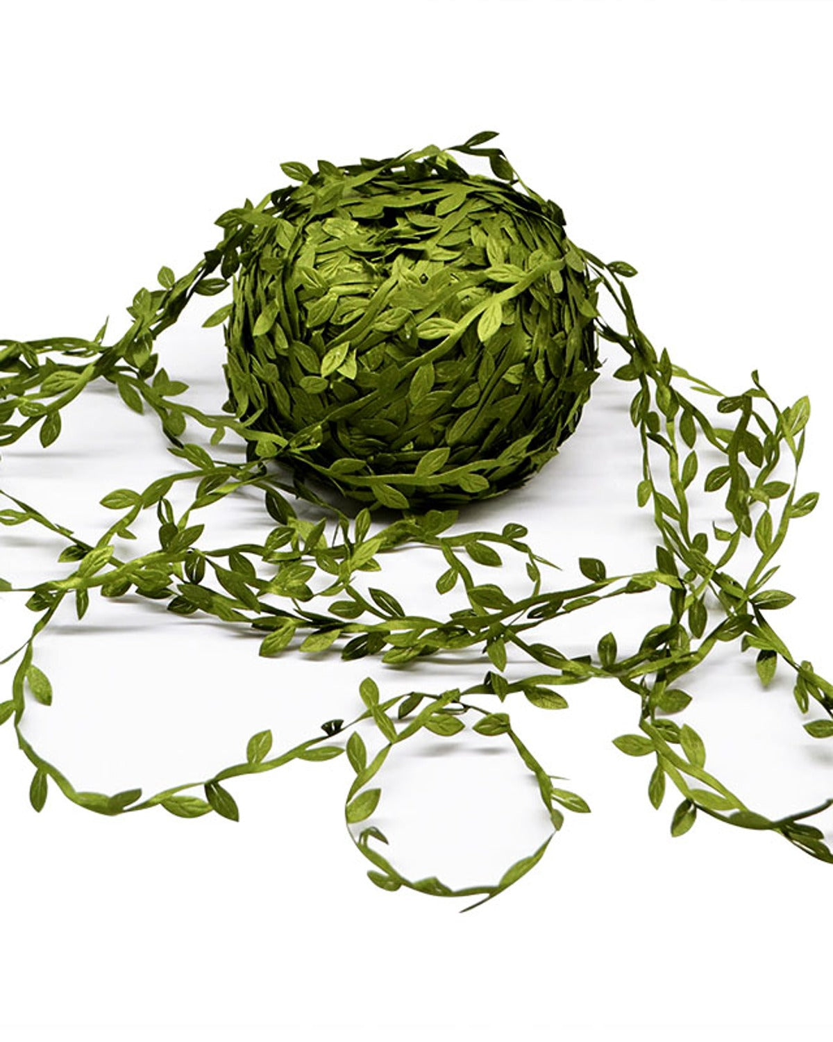 Coil of artificial leaf trim on a white background, one end unwound across the surface