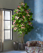 The variegated branch with rose pink tips beside a window (pot not included)