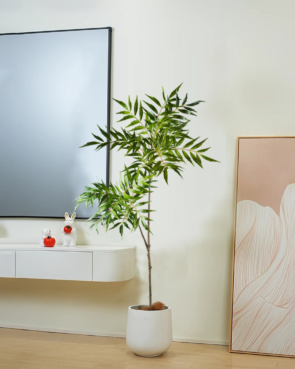 The bamboo branch beside the media unit, seen from further back (pot not included)
