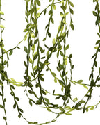 Lengths of the leaf trim hanging straight down, showing the leaves along the cord