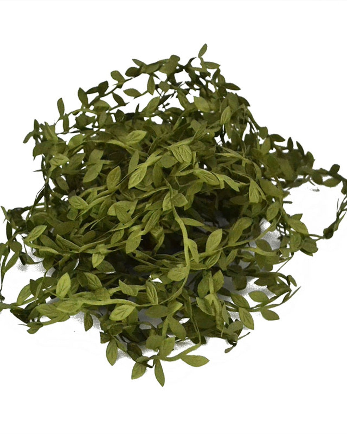 The leaf trim gathered into a dense pile, showing how much is on one coil