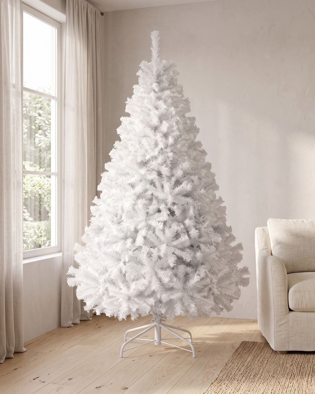 The White tree, undecorated, on its white folding stand in a living room corner beside a tall window