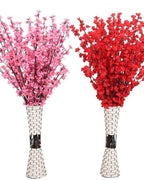 Several branches arranged together in two tall vases, to show the effect of buying more than one