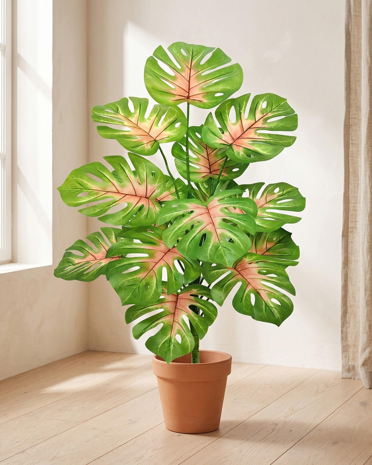 Pink-veined split leaf artificial leaf bush, 32.7 in with fifteen leaves, in a plain terracotta pot on pale oak floorboards; pot not included