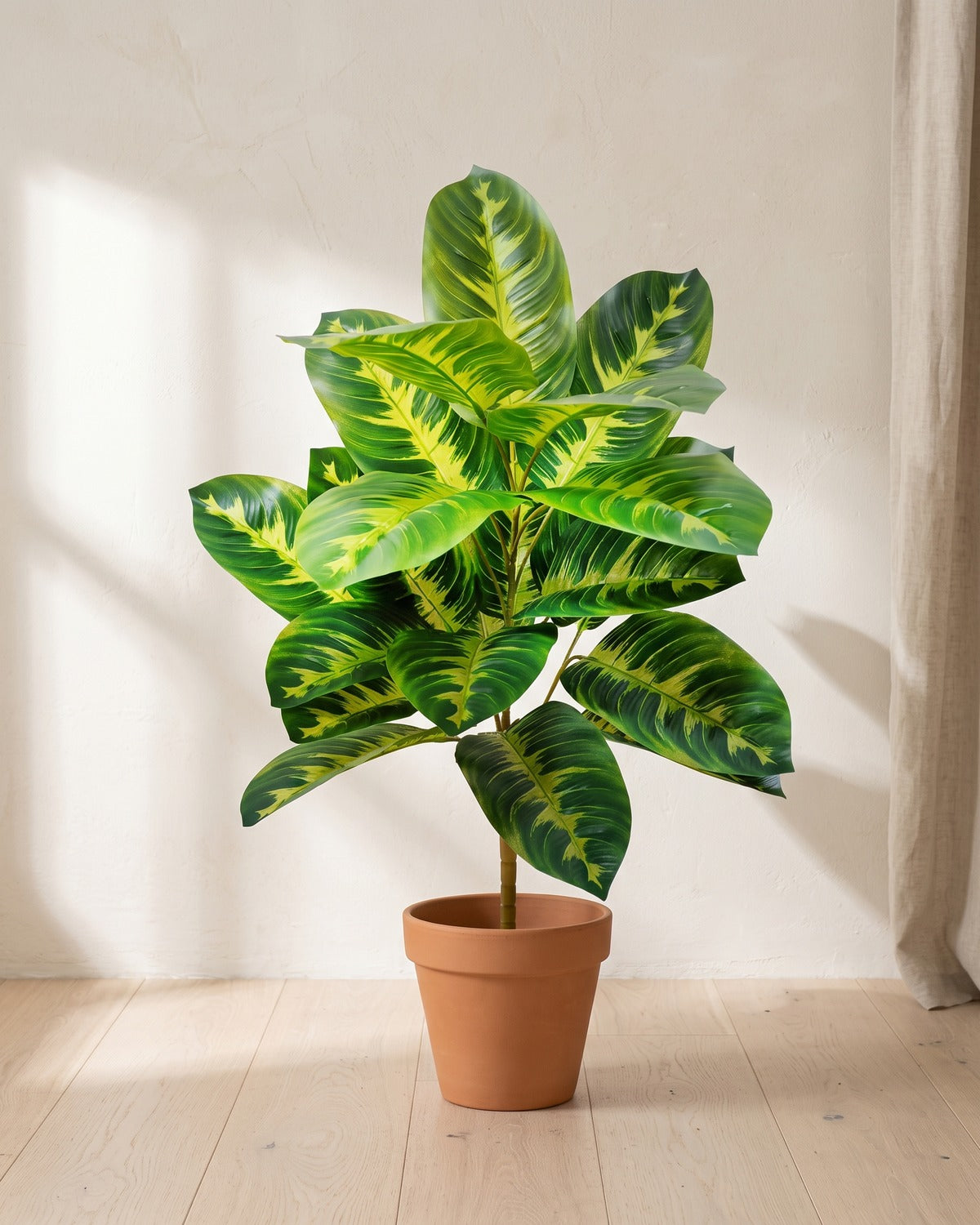 Variegated leaf artificial banana leaf plant, 29.5 in with twenty-one leaves, in a plain terracotta pot on pale oak floorboards; pot not included