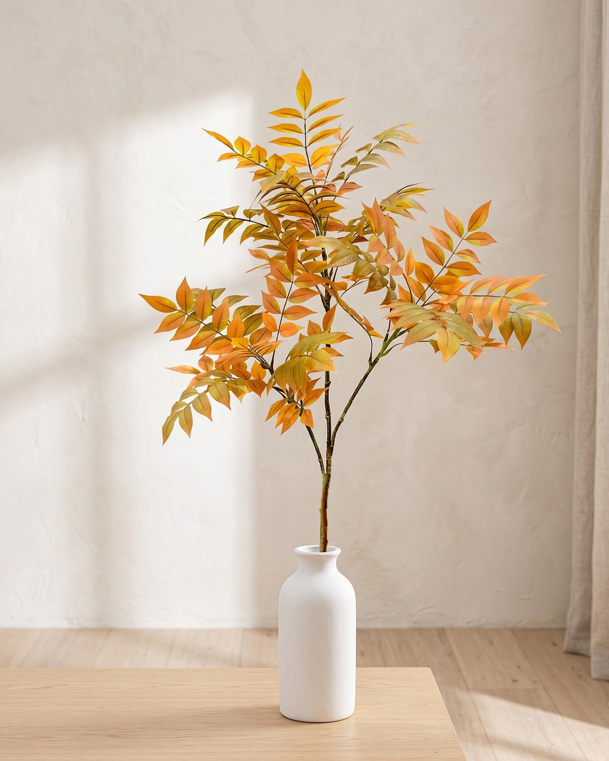 Autumn leaf artificial tree branch, 3 stems, 47.2 in, standing in a plain white vase on a pale oak table; no vase is included