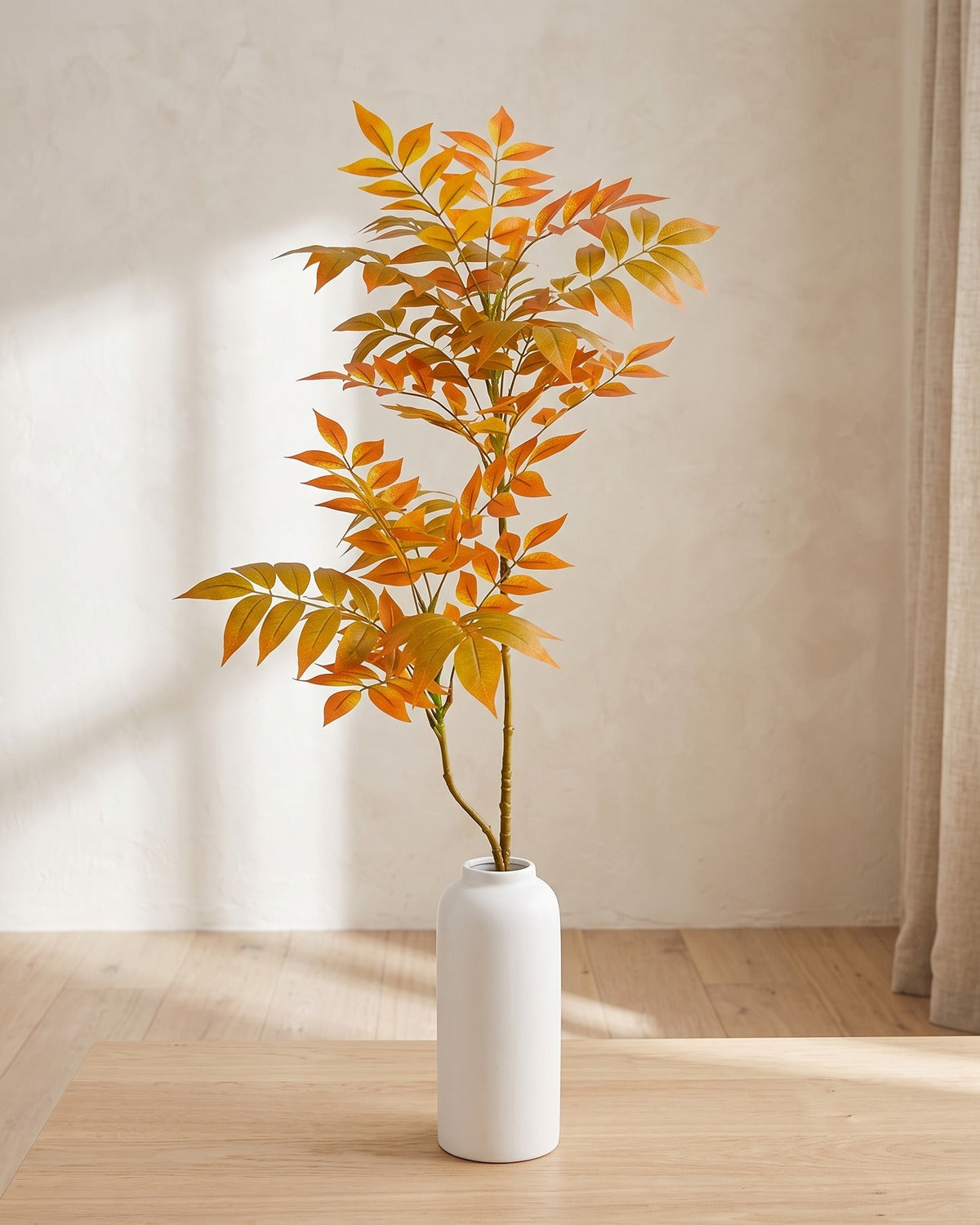 Autumn leaf artificial tree branch, 2 stems, 43.3 in, standing in a plain white vase on a pale oak table; no vase is included