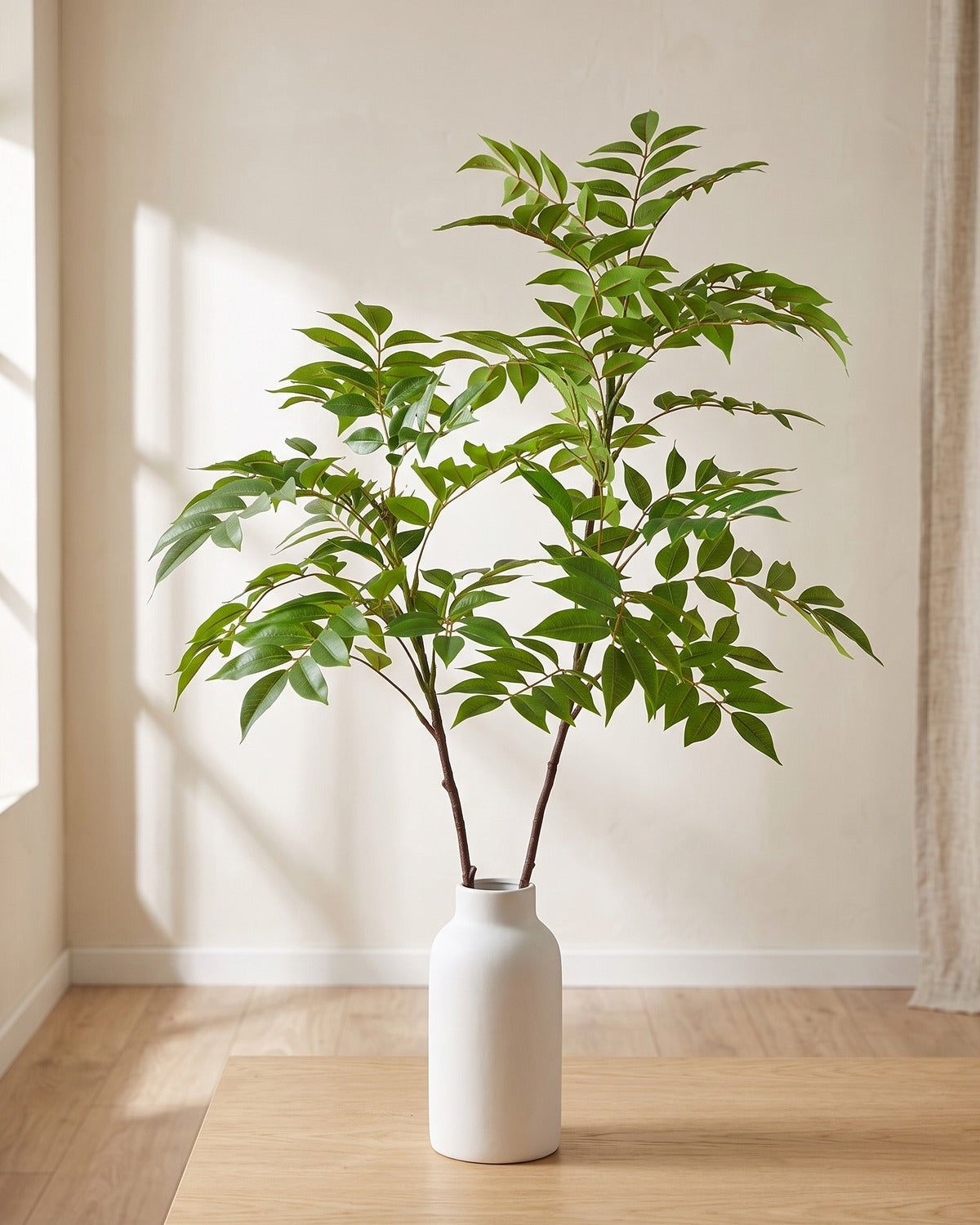 Feather leaf artificial tree branch, set of 2, 36.2 and 43.3 in, standing in a plain white vase on a pale oak table; no vase is included