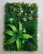 A single artificial plant wall panel, showing the mixed foliage across its face